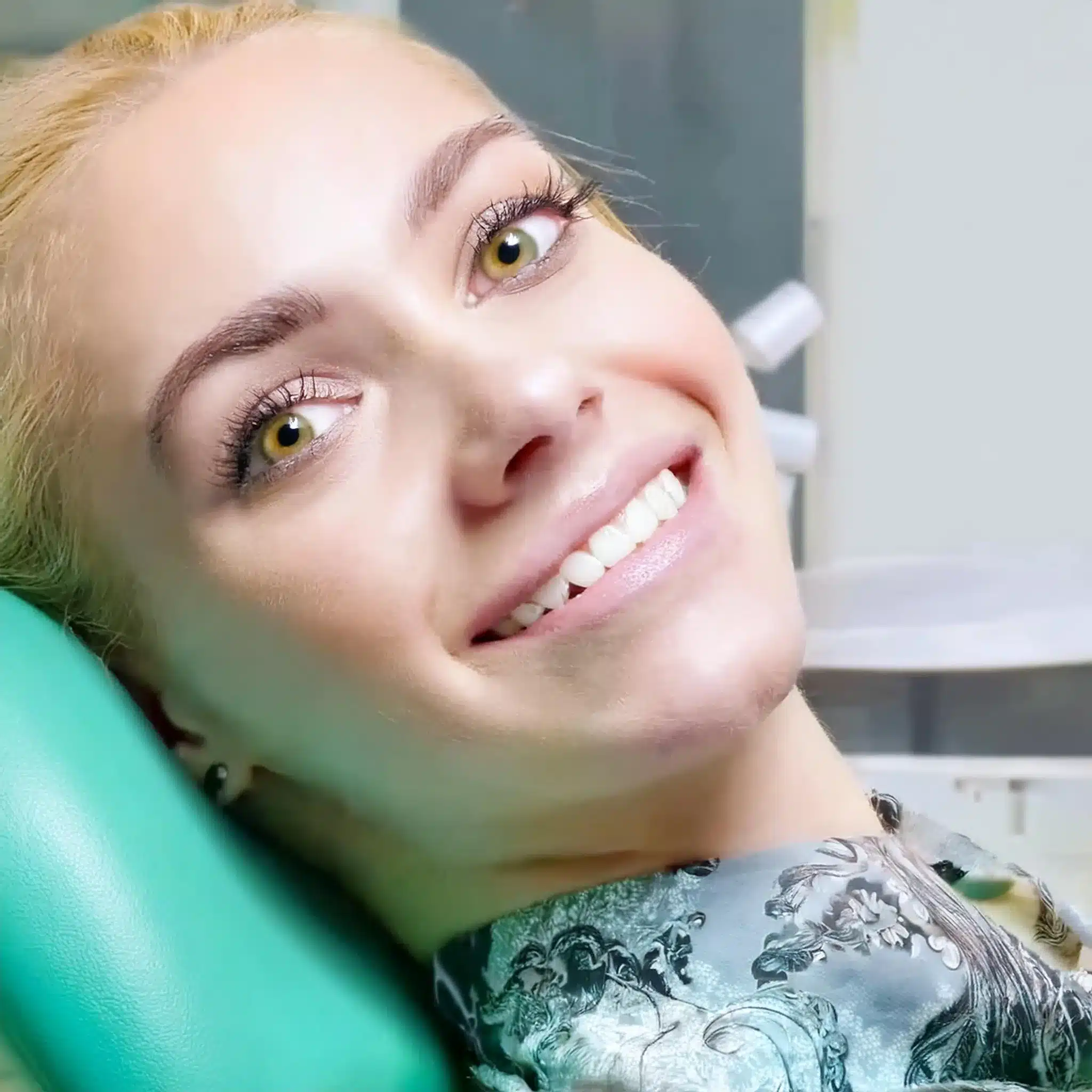 A girl with her new dental implants